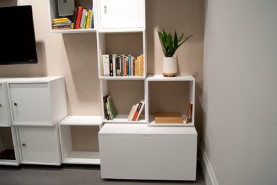 The boxes at the Carnegie-Mellon Design School meeting center serve several functions ranging from book storage to kitchen supplies. Photo Credit Miriam Devlin